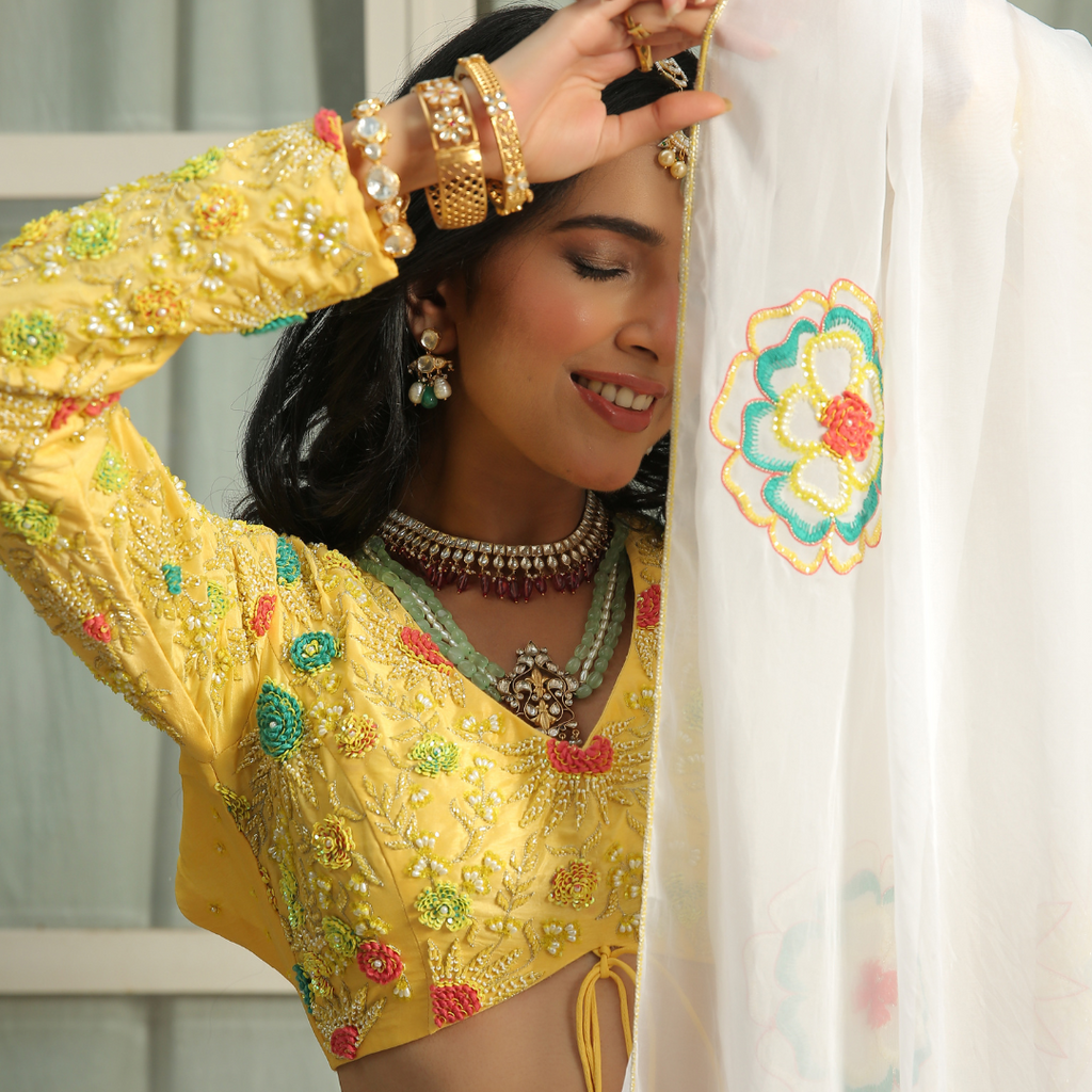 Yellow top with white dupatta