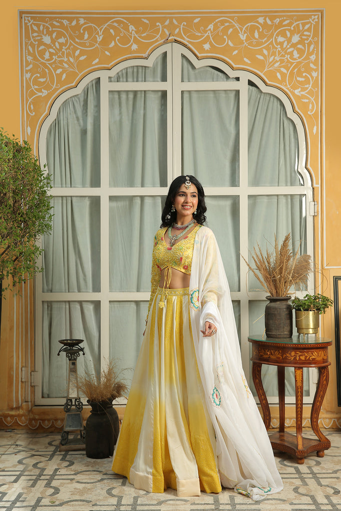 DAFFODIL YELLOW HEAVY HAND EMBROIDERED FULL SLEEVES BLOUSE WITH OMBRÌö EMBELLISED LEHENGA SET